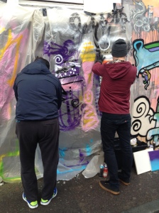 Apostolos and Brent practicing their spray painting skills.