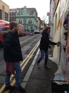 Mitilde and Ben spray painting.